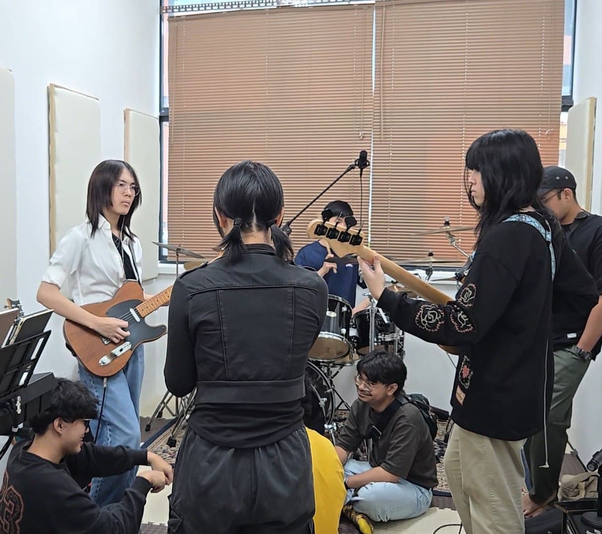 Musicians rehearsing together at Softboiled Studios