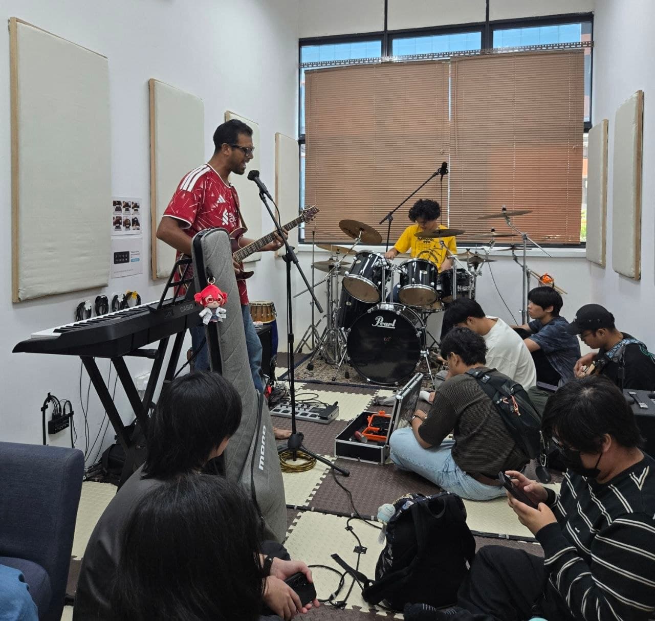 Musicians playing together in a softboiled studios jam night